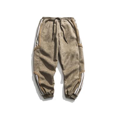 China new Anti-wrinkle lambswool plus velvet pants men's casual winter padded tube toe work pants loose straight suede sports pants for sale