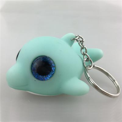 China Promotion Gift Cartoon Glitter Eye Snap Button Key Chain Animal Cute Eyes Jumping Dolphin Plastic Key Chain for sale