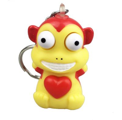 China Ornament Squeeze Heart Snap Button Keychains And Happy Monkey Keyring For Gift for sale