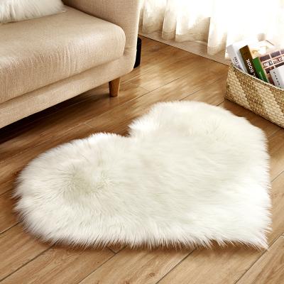 China Washable Super Soft Plush Fabric Faux Sheepskin Heart Shaped Blankets And Rugs For Living Room Home Bedroom for sale