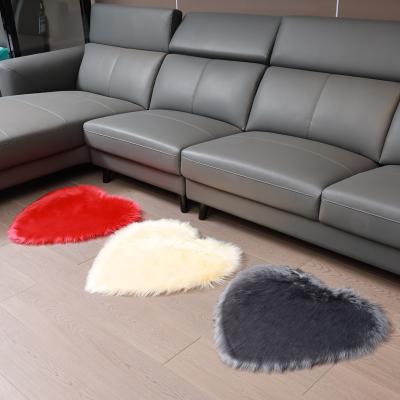 China Luxury Popular Home Furry Sheepskin Rug Rug And Blanket Heart Shape Living Room Decor Faux Fur Plush Washable Rug Cover For Home for sale