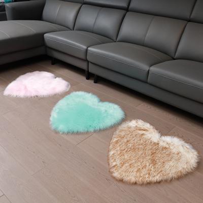 China Washable Super Soft Plush Fabric Faux Sheepskin Heart Shaped Blankets And Rugs For Living Room Home Bedroom for sale