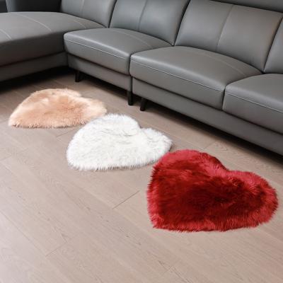 China Luxury And Soft Wool Blanket Washable Irregular Shaped Faux Fur Home Rug for sale