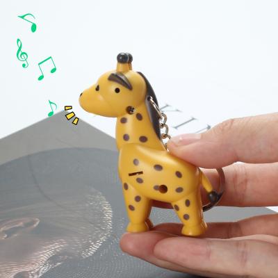 China New Lovely Little Giraffe Plastic Key Chains LED Giraffe Key Chains With Sound For Kids Gifts for sale