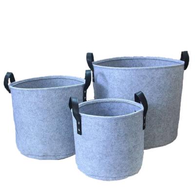 China New Felt Folding New Year's Storage Bucket Home Basket Multifunctional Dirty Bag Clothes And Sundries Bag for sale