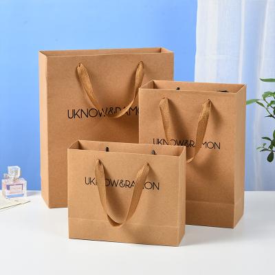 China Recyclable White Card Paper Bag Set Clothing Store Tote Bag Gift Bag Printing Paper Portable Shopping LOGO for sale