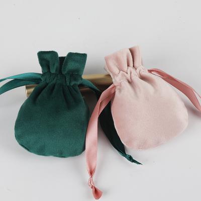 China Recycled Materials Velvet Drawstring Package Pouch Jewelry Cosmetics Skin Care Products Pile Storage Bag Can Be Printed LOGO for sale