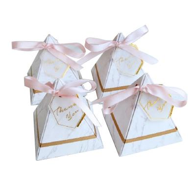 China Creative Wedding Recycled Materials Oed Omd Candy Triangle Box New Marbling Wedding Supplies Foldable Cardboard Gift Boxes For Party Favor for sale