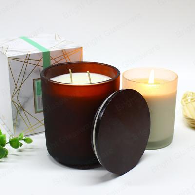 China Weddings Holiday Round Bottom Glass Candle Jars With Lid Customized Amber Candle Vessels For Candle Making for sale