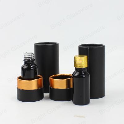 China 30ml 50ml 100ml Essential Oil Cosmetic Bottle Annotate Black Empty Glass Bottle With Lid And Tube Box Wholesale for sale