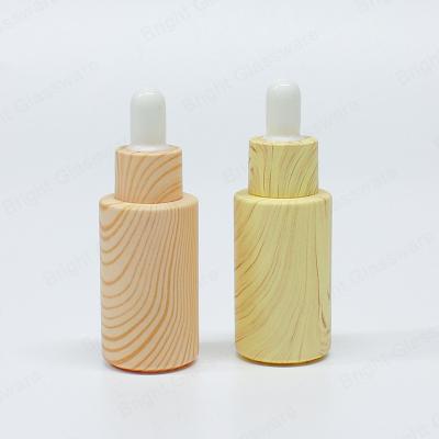 China Personal Care Custom Design Glass Dropper Bottle 5ml10ml15ml20ml30ml50ml100ml Essential Oil Bottles For Cosmetic Packaging for sale