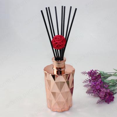 China Personal Care Luxury Unique Design Mounted Gold Diffuser Bottle Rhombus Shape Reed Diffuser Glass For Home Decoration for sale