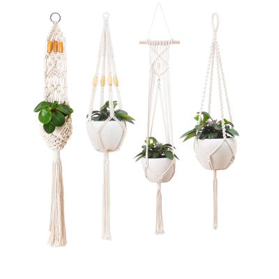 China Plant Eco-friendly Handmade Indoor Decorative Plant Hangers Boho Macrame Flower Pot Holder Planter Wall Cotton Home Decor for sale