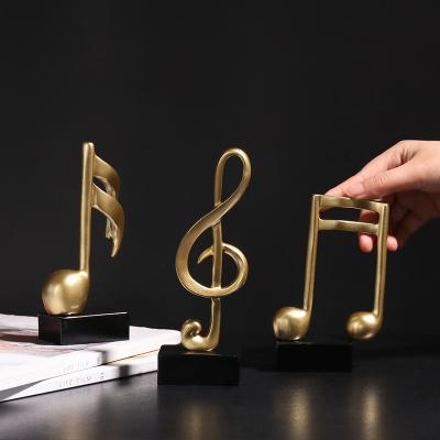 China European Modern Luxury Eco-friendly Decorative Gold Creative Resin Style Hit Amazon Musical Note Light Ornaments Home Decor for sale