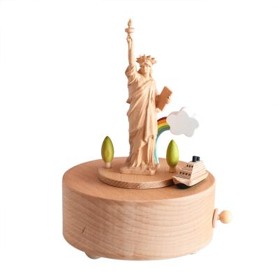 China New Wholesale Gifts The Statue Of Liberty Custom Wooden Music Box For Friends for sale