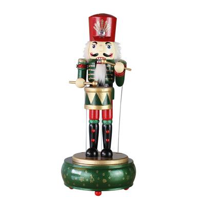 China Beautiful designs green wooden creative hot fashion European style nutcracker music box for family for sale