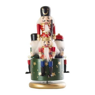 China Fashional New Figurine Nutcracker Wooden Rotating Green Dancing Music Box for sale