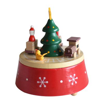 China Eco-friendly Christmas Tree Snowman Carriage Round Bass Plastic Music Box for sale