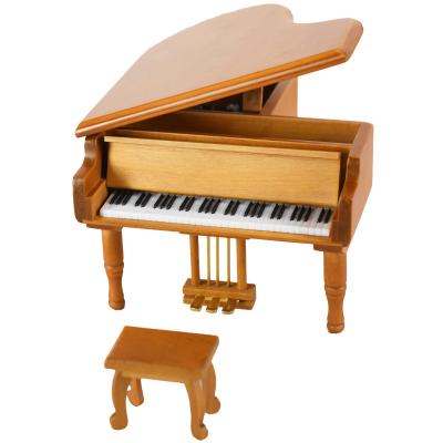 China Birthday Gift Brown Piano Music Box For Baby Toys for sale