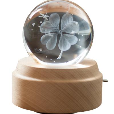 China Custom Music Box Beautiful Designs 3D Crystal Ball Music Box Rotating with Night Light and Wooden Base Gift for Birthday for sale