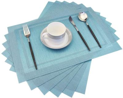 China CR Stocked Heat Insulation Non Slip Plastic Place Mats, Washable Woven Vinyl Kitchen Stain Resistant Place Mats For Dining Table Set Of 4 for sale