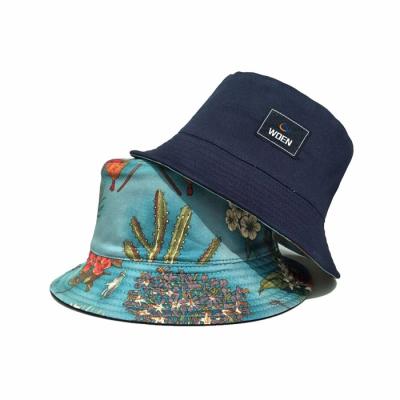 China Character White Two Sides Wear Custom Logo Printing Pattern Bucket Hats for sale