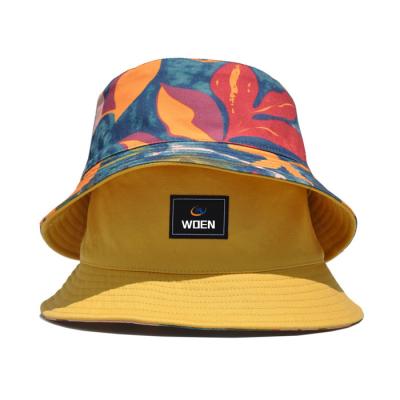 China Short Bucket Hat Character Designer Printed Custom Bucket Floral Brim Bucket Hat for sale