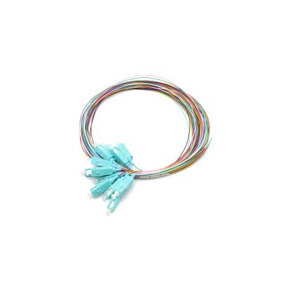 China FTTX Fiber Optic Pigtail 0.9mm 12 Core Color SC PC Multimode Fiber Optic Pigtail for sale