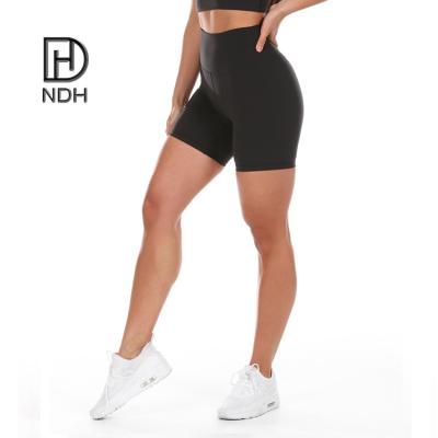 China Breathable Girls Black Classic Yoga Shorts Sport Wear With Inside Pockets Four Way Stretch Made With Recycle Nylon for sale