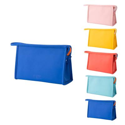 China Fashion Solid Color Clutch Large Capacity Storage Bag PU Material Makeup Bag for sale