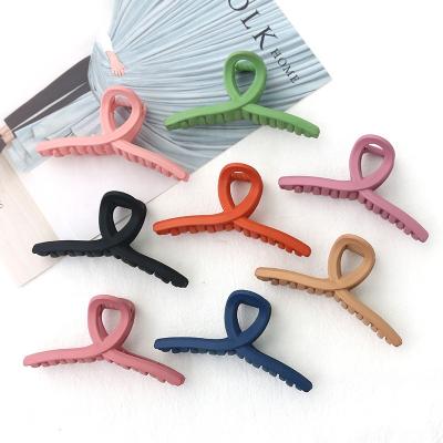 China Custom Wholesale Plastic Hair Accessary Hair Claw Clip Cross Hair Clip Sling For Women Girls Hair Accessories for sale