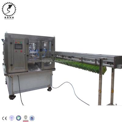 China Beverage Spout Pouch Packing Machine Pneumatic Filling Capping Machine for sale