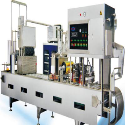 China Beverage fruit puree packing machine adopt piston filling equipment and sealing optional for sale