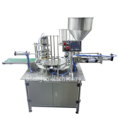 China Coffee Rotary Filling Sealing Machine for sale