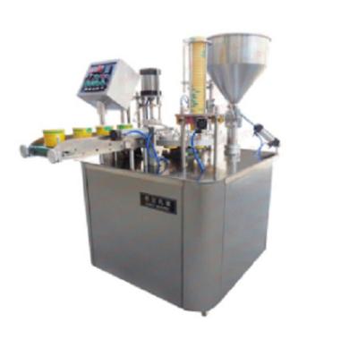 China Food Factory Price Cup Filling Machine Rotary Cup Filling Sealing Machine for sale