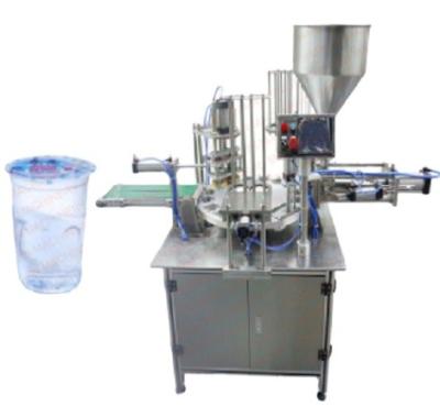 China Rotary Beverage Cup Sealing for Water/Drinks/Ice Cream Jelly/Juice/Milk /Buttermilk Filling and Sealing Machine for sale