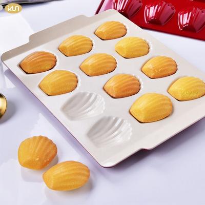 China 12 Cavity Modern Viable Madeleine Bakeware Spherical Shell Carbon Steel Madeleine Molds for Oven Baking for sale