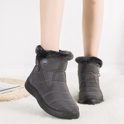 China Fashion trend warm women's winter ankle fur women's clothing waterproof snow boots short shoes for sale