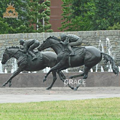 China Traditional Life Size Racetrack Riding Horse Racing Bronze Jockey Sculpture Statue for sale