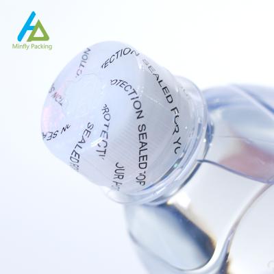 China 30ML 50ML 100ML Heat Waterproof PET PVC Shrink Sleeve Waterproof Custom Printing Label For Beverage Transparent Flip Bottle Cap for sale