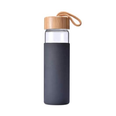 China Wholesale Promotion Custom Gift Honesttree Water Bottle Glass Water Bottle With Bamboo Color Lid And Silicone Cover for sale