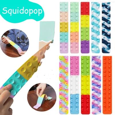 China Toy New Design Soft Silicone Squidopops Relieves Stress Toys Rainbow Noise Squidopop Pull the fidgety person Toy Squido Pop for sale