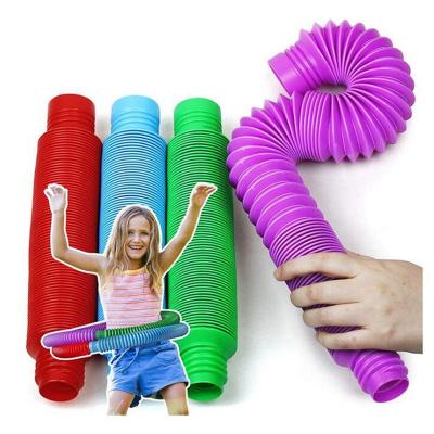 China Relaxing Colorful Diy Toys Building Plastic Wiggle Sensory Tools Sound Tubes Whistle Sensory Toys For Kids Stretch for sale