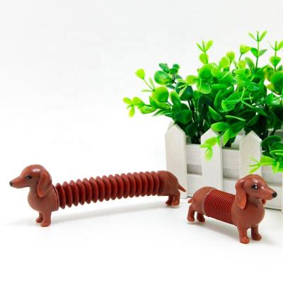 China Relieve Effort High Quality Magical Plastic Dachshund Restless Person Dog Flexible Telescopic Toys For Children for sale