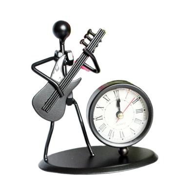 China Europe Forged Metal Opens Creative New Arrival Vintage Music Iron Man Pratical Clock for Office Decoration for sale