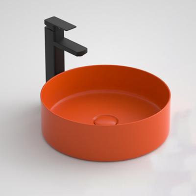 China Easy Clean Wash Basin Multicolor Popular Matte Nordic Modern Art Orange Ceramic Sanitary Basin for sale