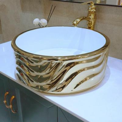 China European New Fashion Design Wave Texture Round Art Basin Sink Gold Countertop Mounted Luxury Bathroom Vanity Sink for sale