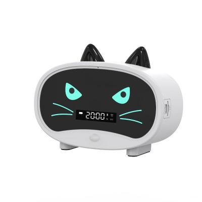 China AirPlay Cat Image Desktop Home Portable Alarm Clock Support Tf Card Mobile Phone Music Mini Wireless Charger Speaker for sale