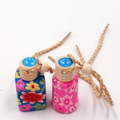 China Popular Empty Packaging Gift Car 10ml Colorful Hanging Perfume Glass Bottle for sale