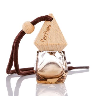 China Gift Wholesale 10ml Empty Diffuser Duct Air Hanging Cap Wooden Car Perfume Bottle for sale